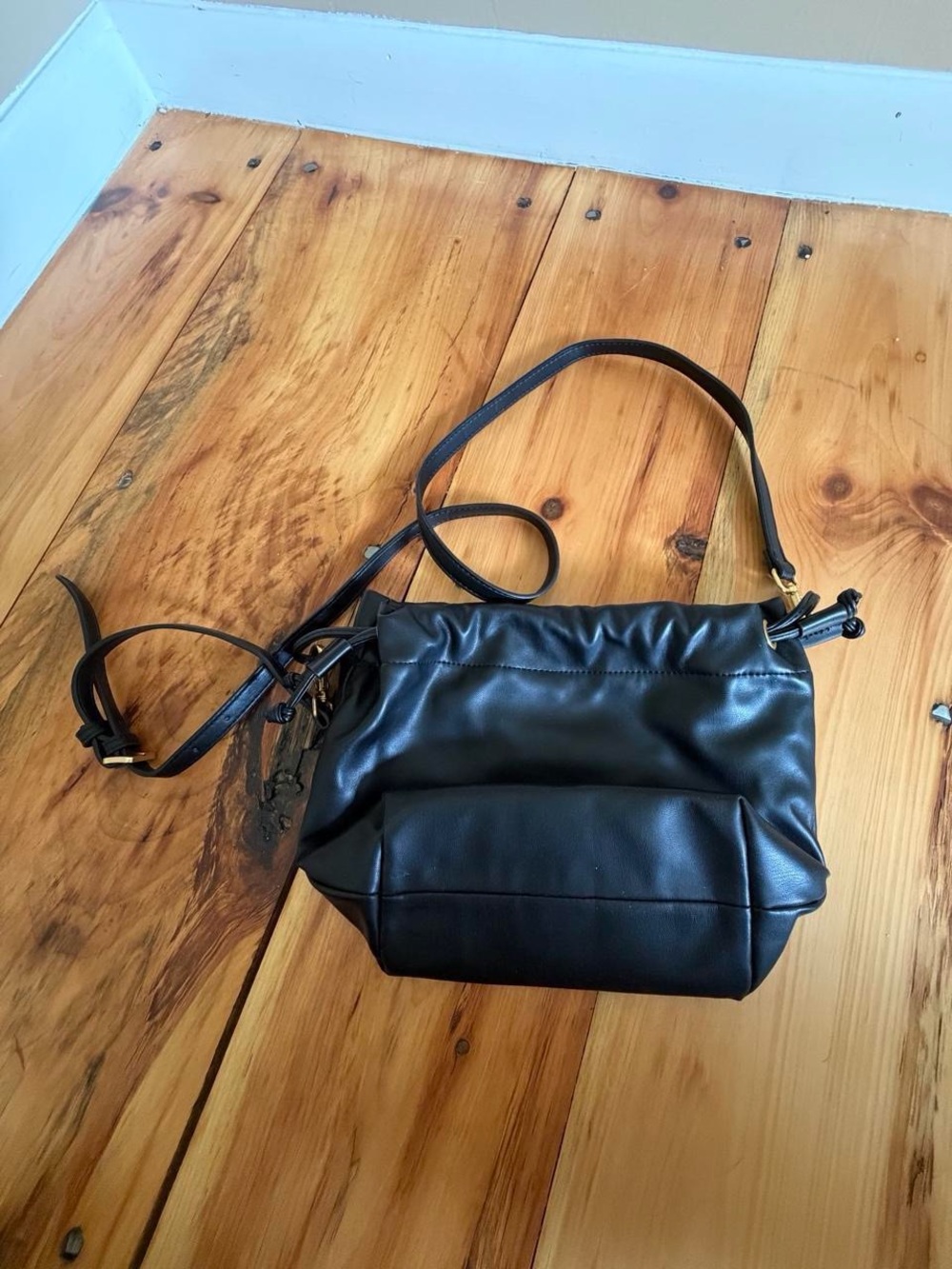 Black Melie Bianco vegan leather bucket bag with detachable long crossbody strap